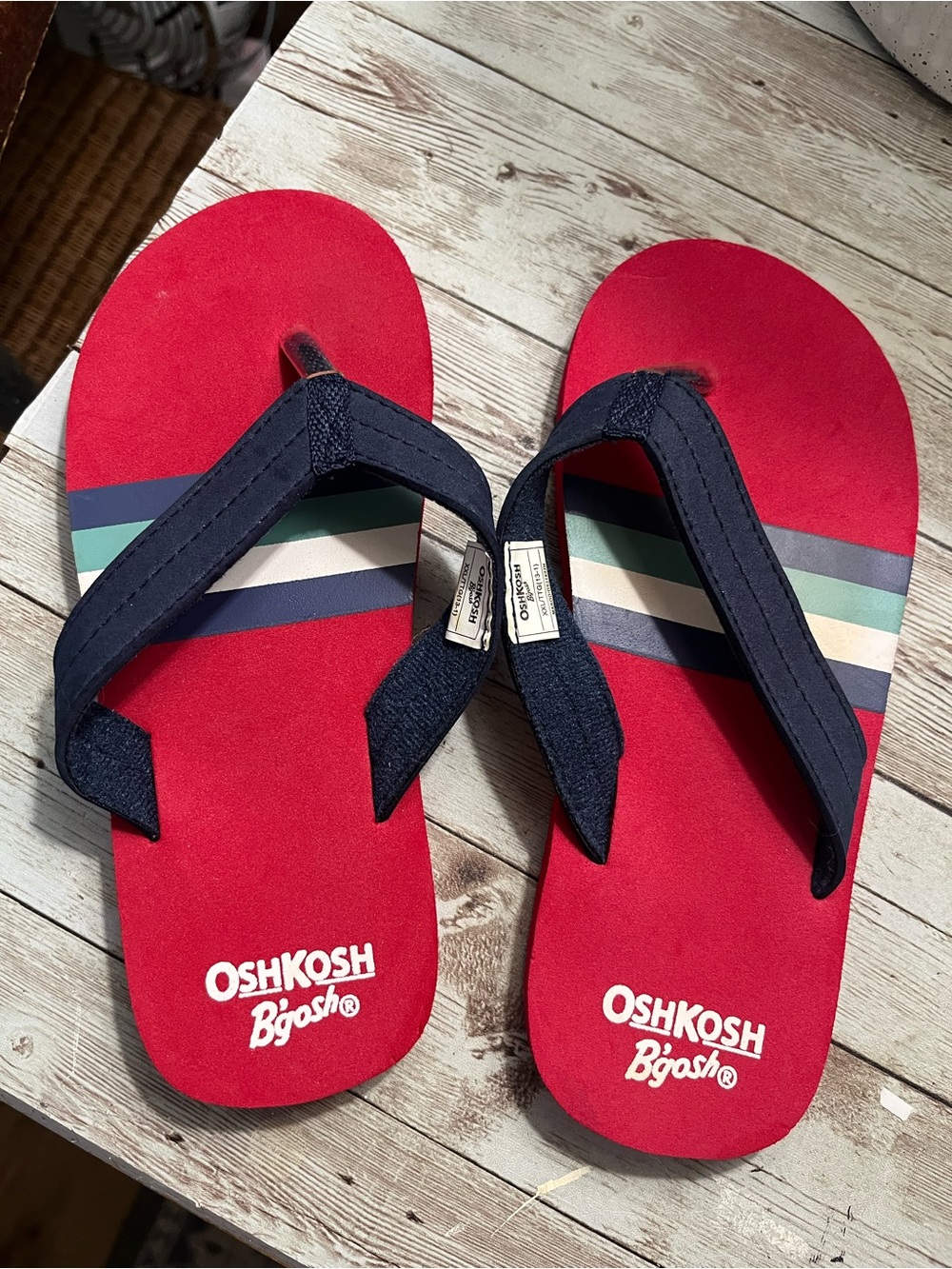 OSH Kosh flip flops